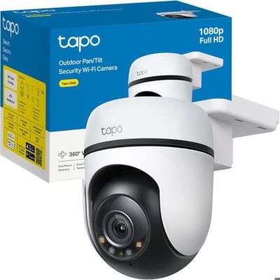 a close up of a camera with a box in the background