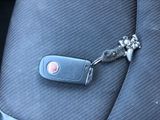 a car key in the back seat of a car