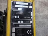 a sign on the side of a building that says security