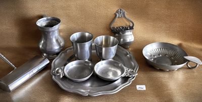 a lot of silver items that are on a table