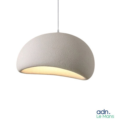 a white light that is hanging from a ceiling