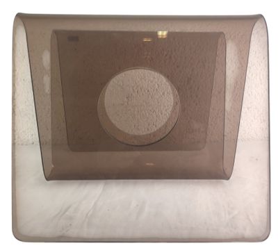 a glass plate with a circular hole in the middle