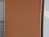 two refrigerators that are next to each other in a garage