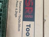 a box with a sign on it sitting on the floor