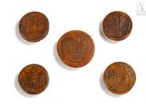 six different types of coins are shown on a white surface