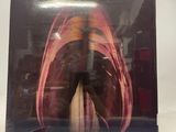 the back of a cd case with a picture of a woman ' s legs