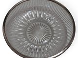 a glass plate with a circular design on it