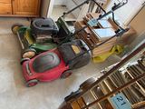 a lawn mower sitting in the middle of a room