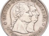 un gros plan d'une pièce de monnaie sur laquelle figurent deux faces