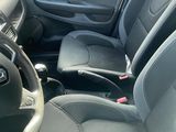 a car with a steering wheel and a dashboard