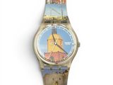une photo d'une montre sur laquelle figure l'image d'un phare