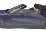 a picture of a blue sports car with its doors open