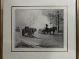 framed photograph of a horse drawn carriage being pulled by two men