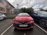 two cars parked in a parking lot next to each other