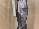 the mannequin is wearing a silver dress on a mannequin mannequin mannequin