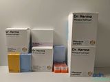 three boxes of dr herma products are sitting on a table