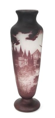 a vase that has a picture of a castle on it
