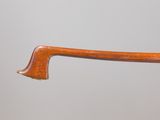 a close up of a wooden handle on a wooden chair