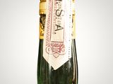 an image of a bottle of alcohol sitting on top of a table
