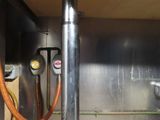 a metal pipe that is connected to a metal pipe