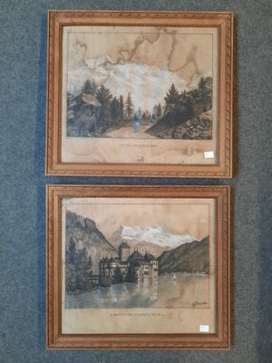 une paire d'aquarelles représentant des montagnes et un lac, dans un cadre en bois