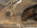 a close up of a piece of wood with a piece of wood sticking out of it