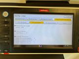 an image of a printer with a screen on it ' s side