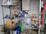 a room that has a lot of items on the shelves