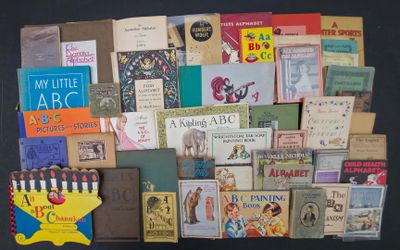 many books on the table with a hanukah menorah on it