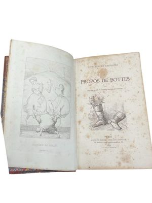 an old book with a picture of a man and a woman on it