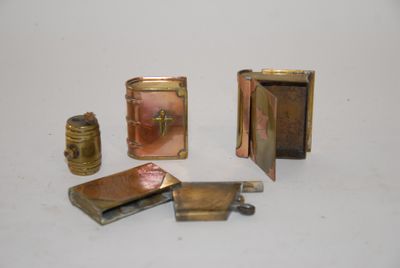 four different types of lighters sitting on a table