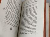an open book that is sitting on a table