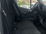 a white van with black seats in the back of it