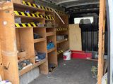 an image of a van with a lot of tools in it