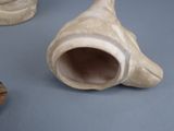 three vases that are sitting on a table