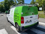 a van that is parked on the side of the road