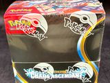 a box of pokemon trading cards sitting on a table