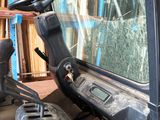 an image of a forklift driver ' s seat in the back of a truck