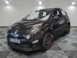 a picture of a small black car parked in a garage