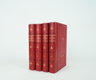 trois livres rouges superposés sur une surface blanche