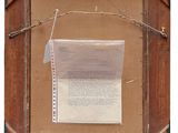 a picture of a piece of paper hanging on a wall