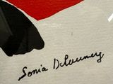 someone is writing something on a piece of paper with a pen
