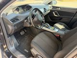 the interior of a car with a steering wheel and a dash board
