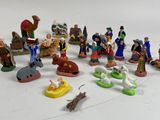 many figurines that are on a table