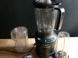 a blender that is sitting on a table next to other items