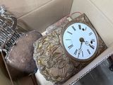 a box with a clock inside of it that is in a box
