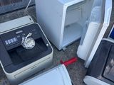 a microwave, a microwave oven, and a microwave oven sitting on the ground