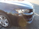 a close up of a car that has a denting on it