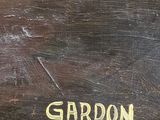 an image of a close up of a wooden table with a clock on it