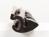 a sculpture of a knife and fork on a white surface